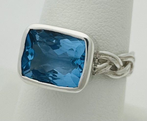 Silver bezel set swiss blue 3 carat cushion topaz